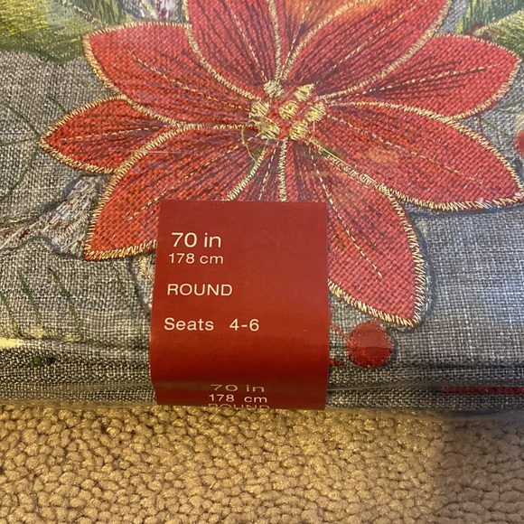 HOLIDAY POINSIETTA TABLECLOTH, 70in round, gray & red, new in bag - Picture 3 of 7